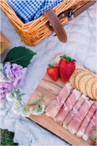 picnic food in the garden for engagement session