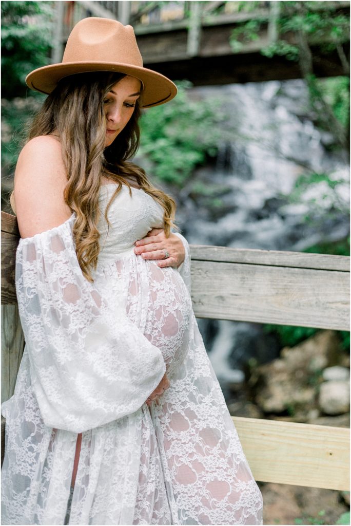 Maternity photo in front of waterfall at amicalola falls