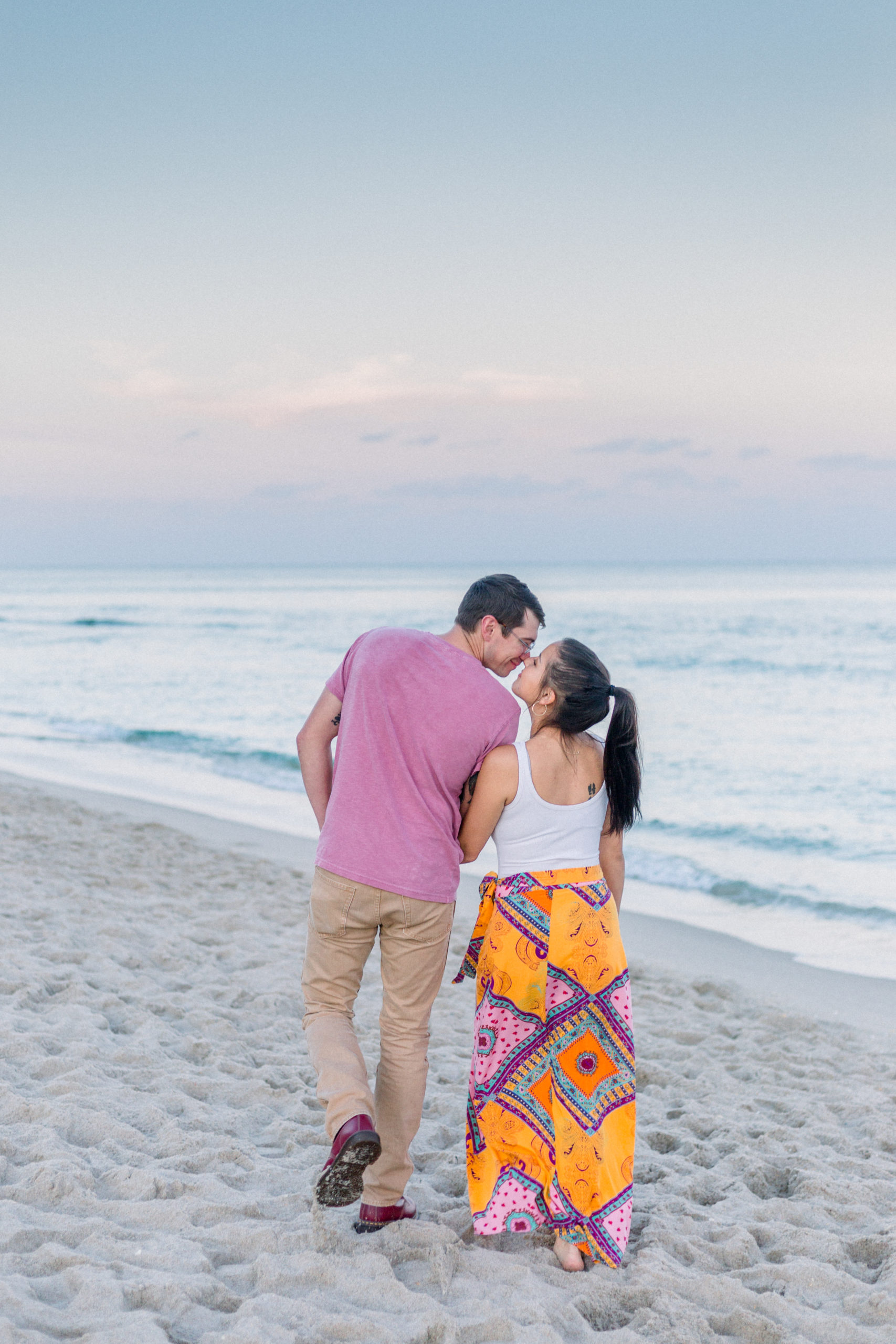 Couple kissing at the beach during their Miami Engagement Session